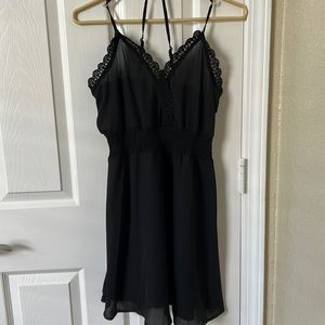 SHEIN, black romper with adjustable straps, size medium, never worn